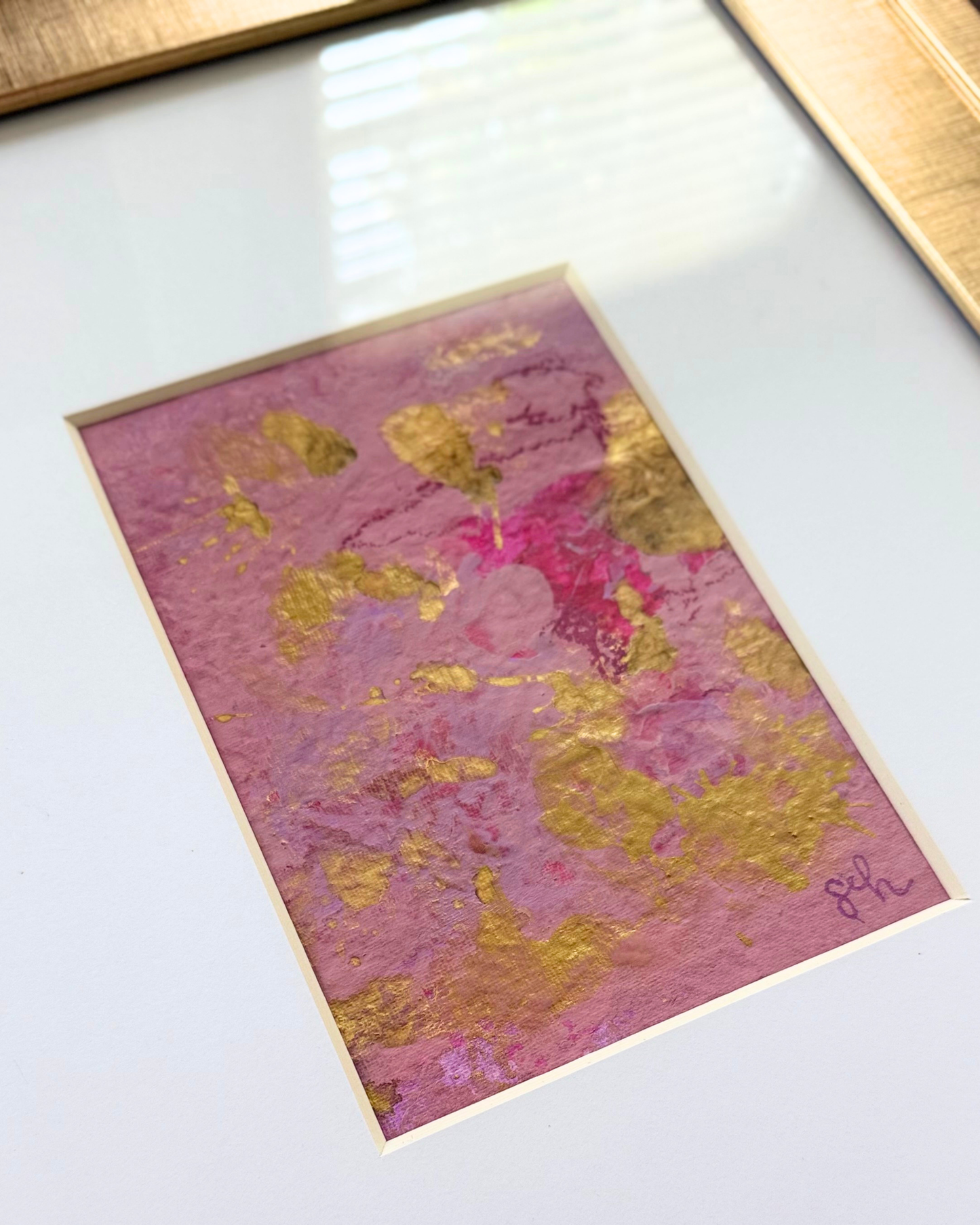 Detail of Rosy Outlook No. 02 — gold leaf, magenta and blush on textured handmade paper