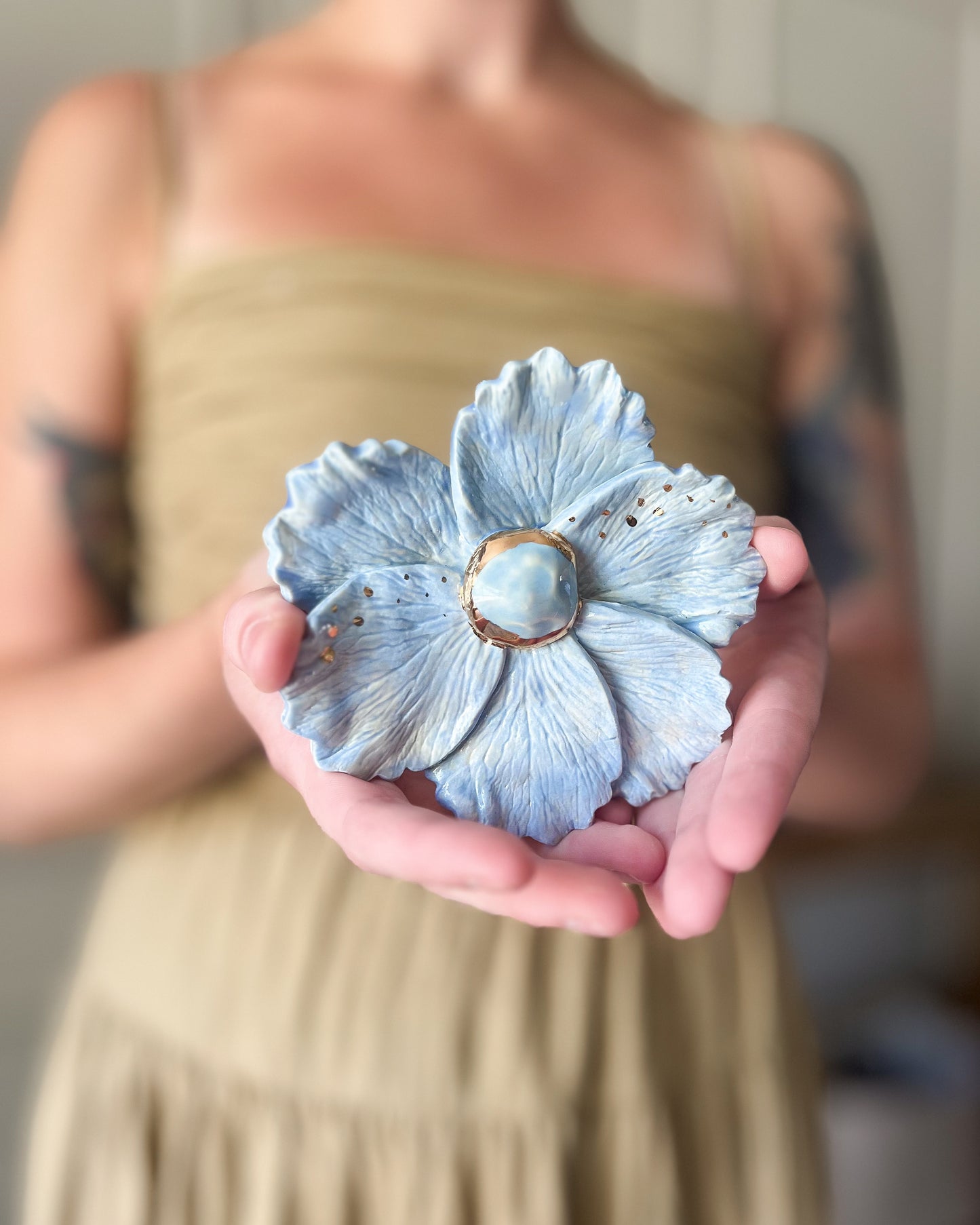 gilded ceramic flower